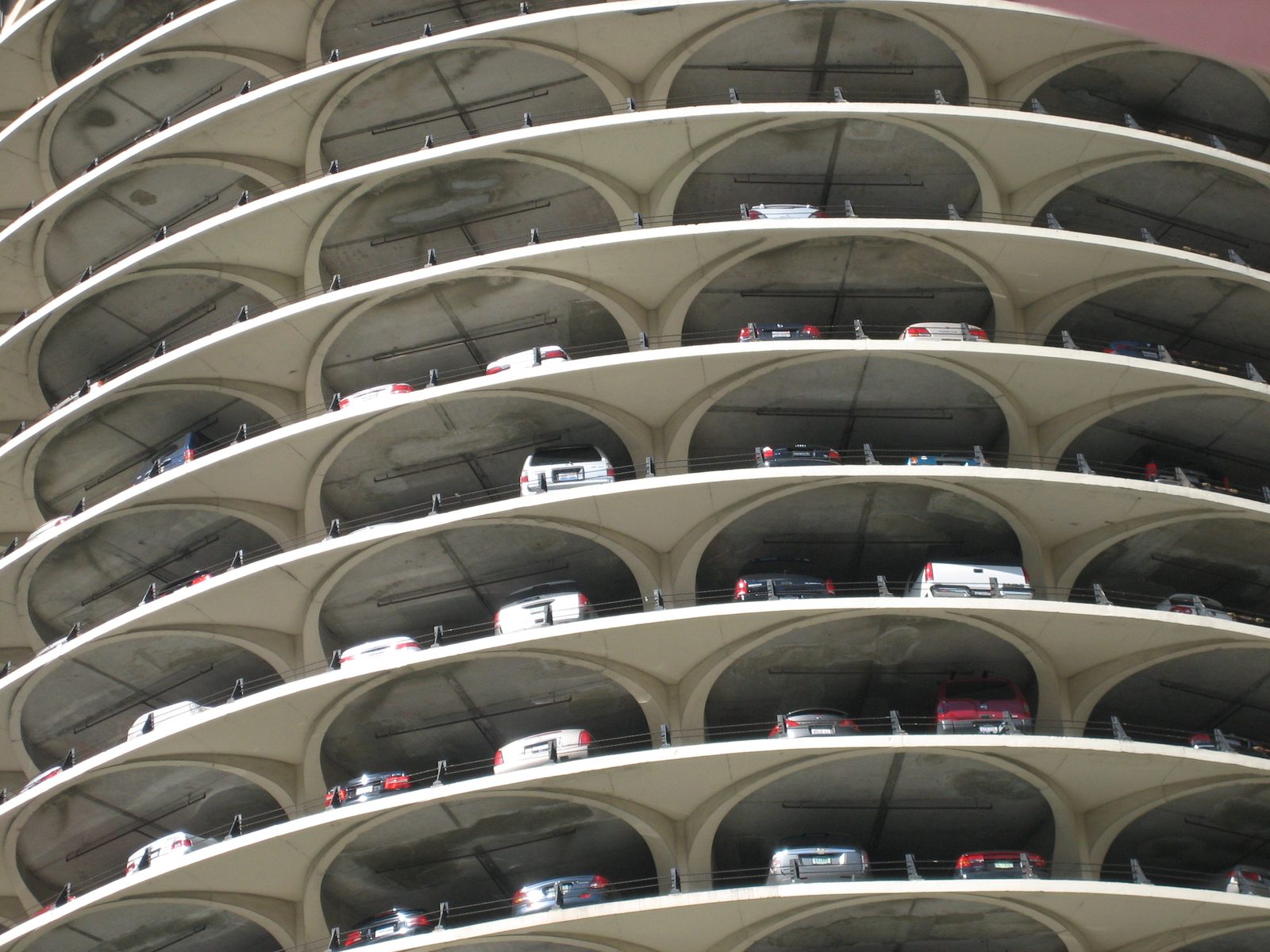 An interesting parking area that takes up the first eighteen floors of the "corn cob" apartment...