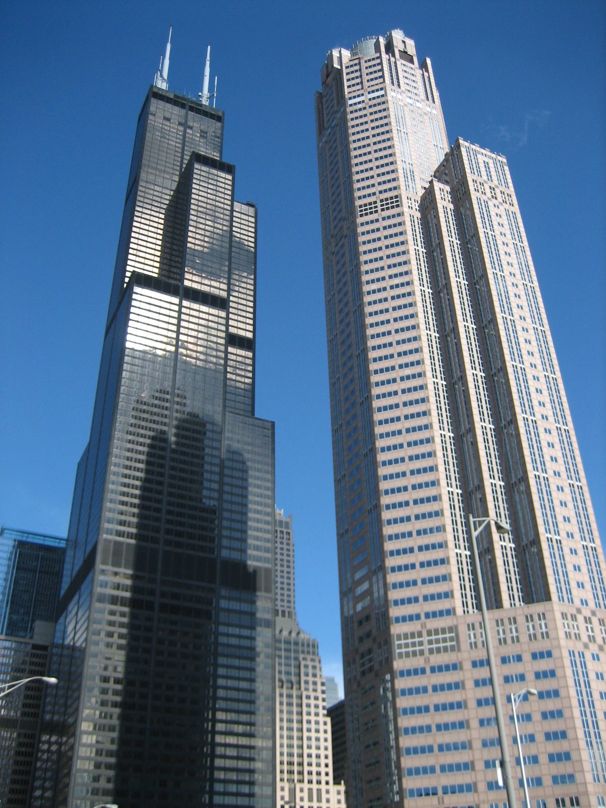 Two very tall buildings.  311 Wacker looks almost as tall because it is significantly shorter (I...