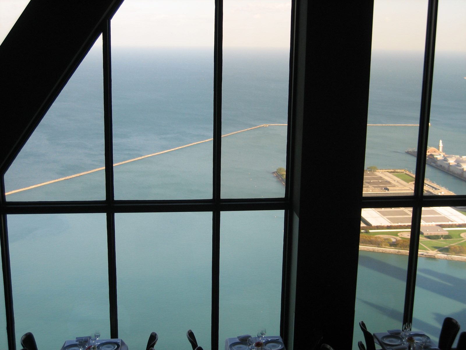 Looking down into the restaurant in the Hancock Building, and out the windows onto the lake.