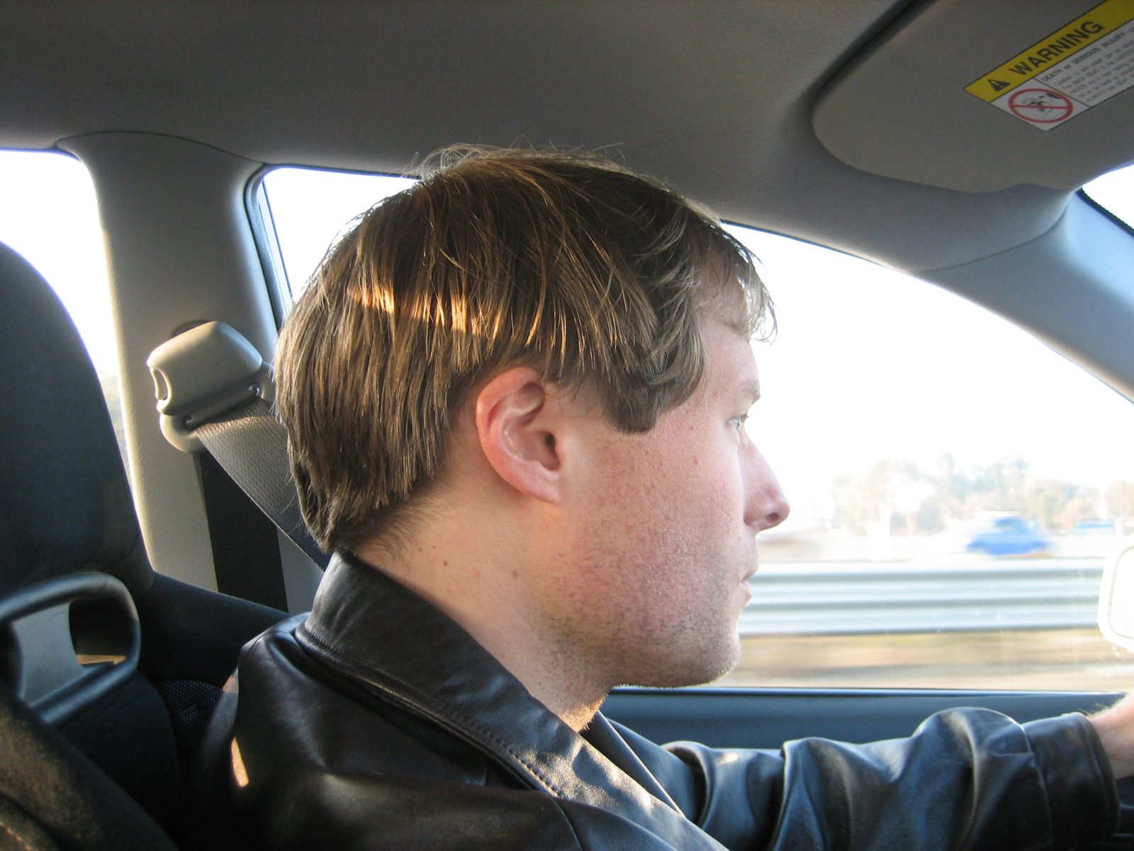 John's awesome haircut, with one unfortunate long piece.