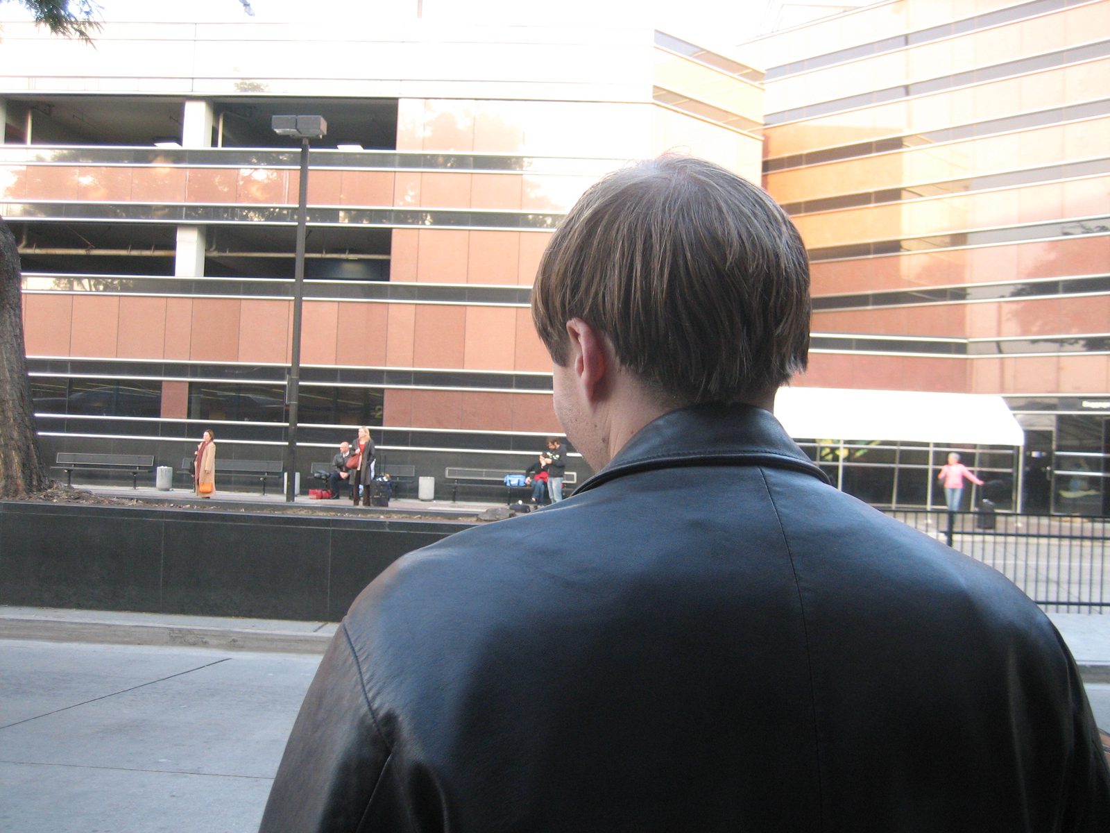 The back of John's awesome haircut, at the airport.