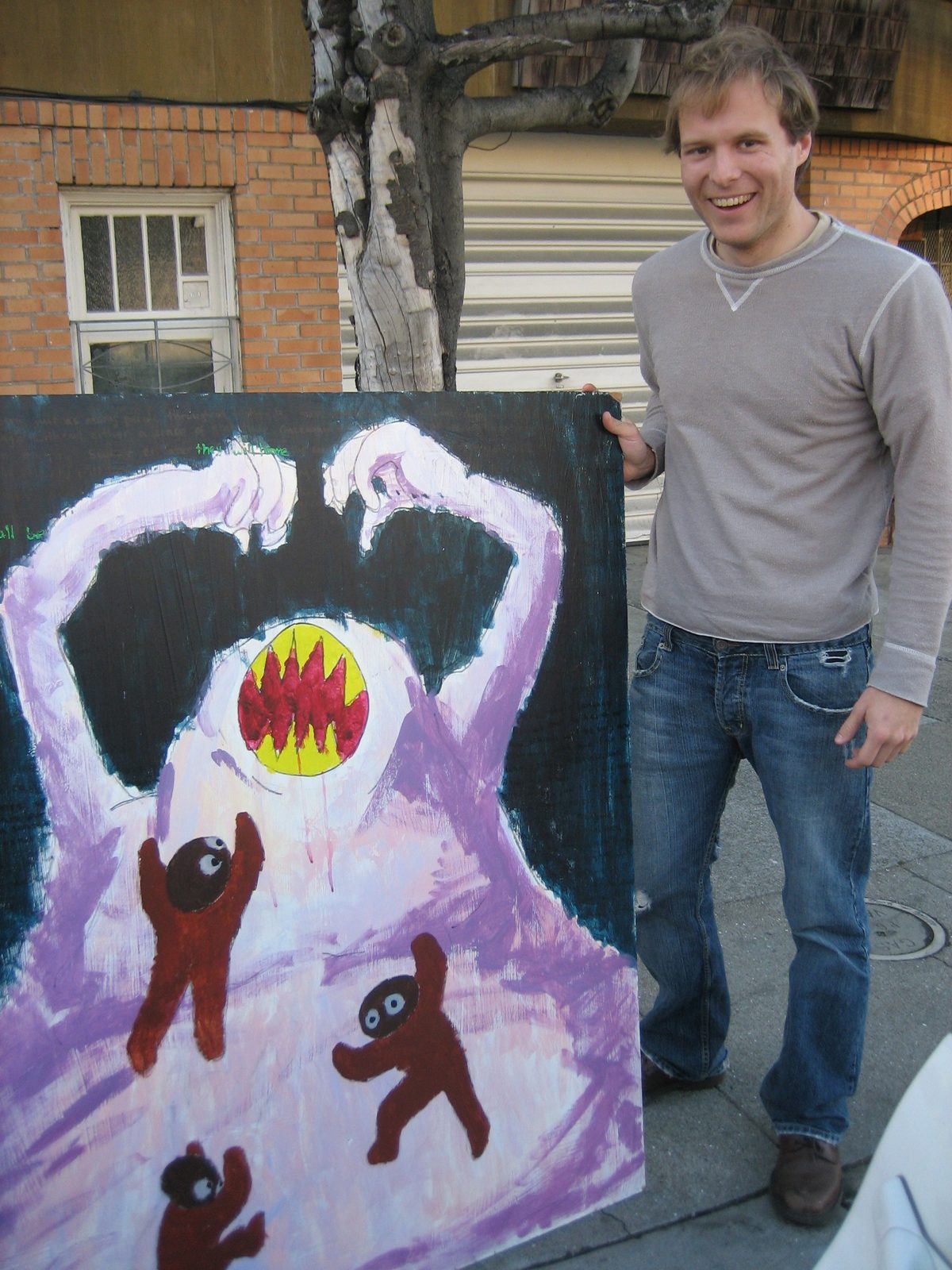 John with his newly acquired piece of fine art.