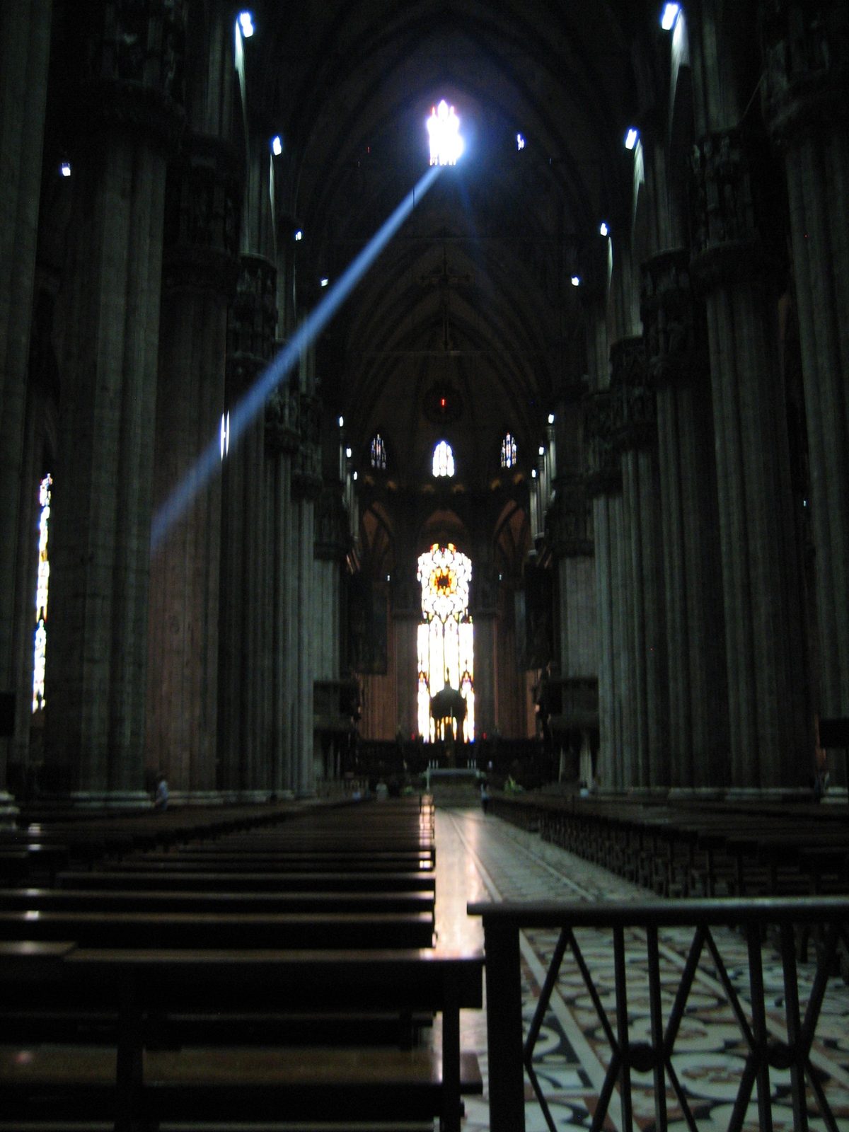 One beam of light was streaming through one of the higher windows.
