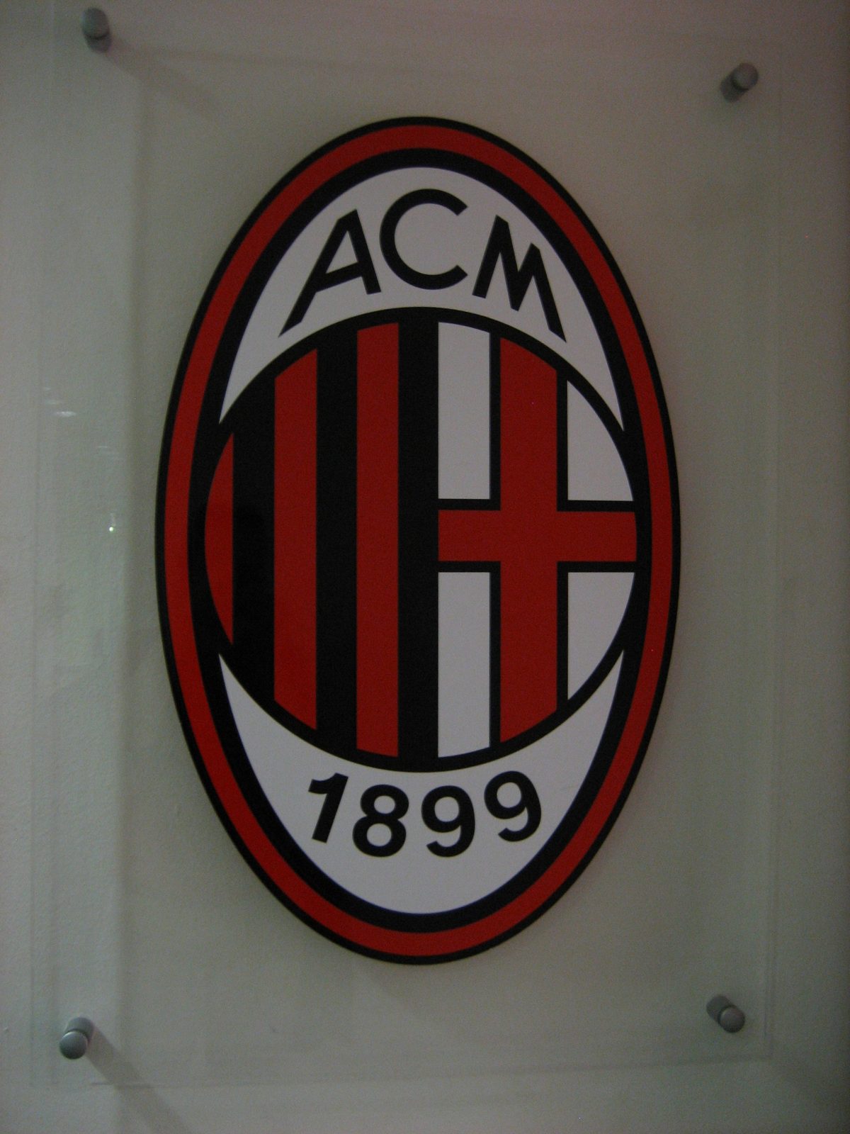 AC Milan logo, locker room entrance.