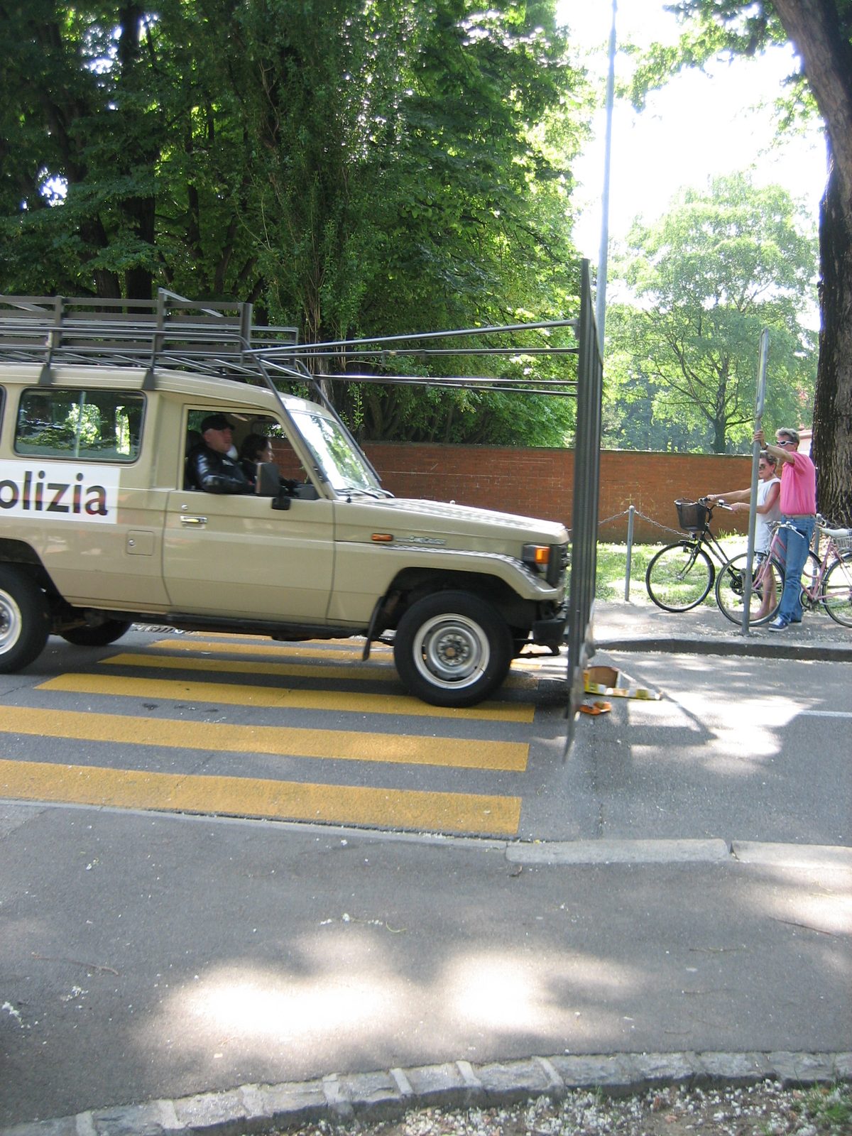 People-pusher car at the end of the parade.