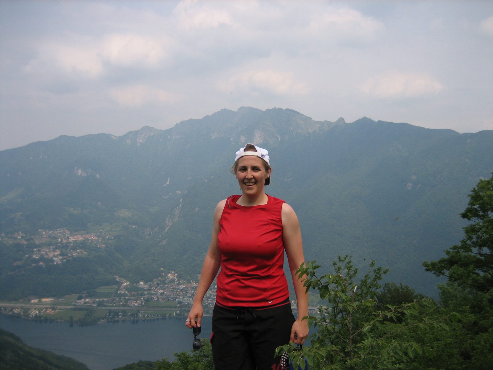 Catherine at the first of two false-finishes to the climb, with Lake Lugano in the background. ...