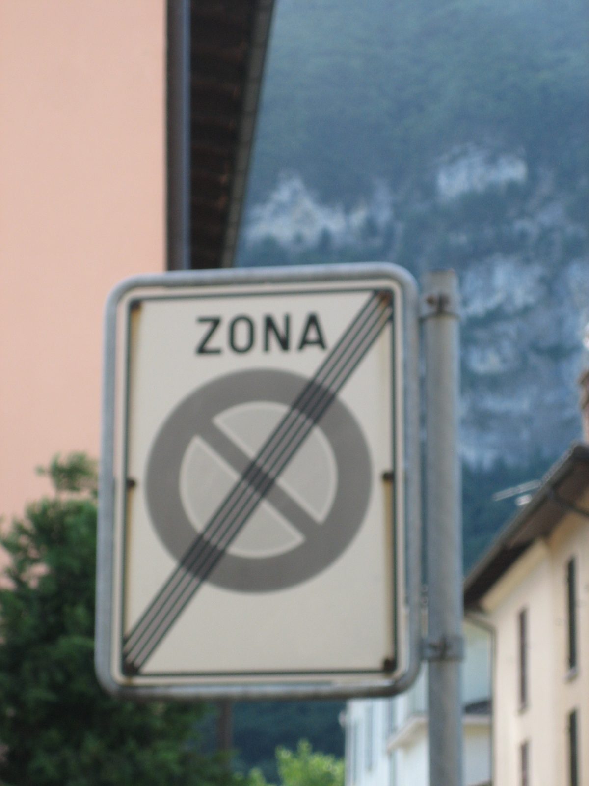 A road sign I never figured out.  "Zone of stopping... stopping?"  Not sure.  "No more no...