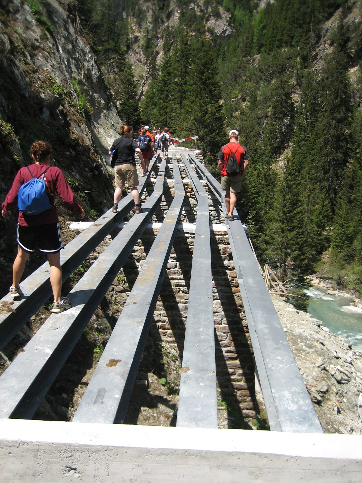 We came upon an unfinished bridge on the trail.  Going back to the main road was not an option,...