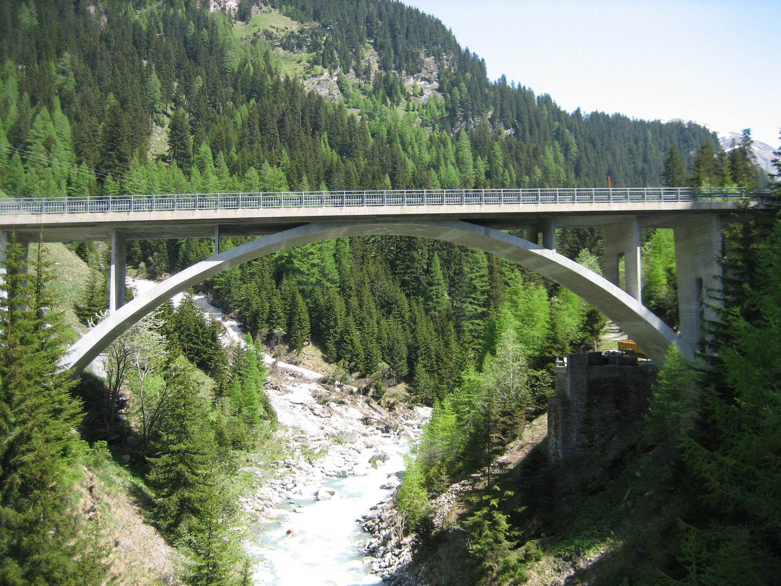 Looking back at the concrete arch bridge.