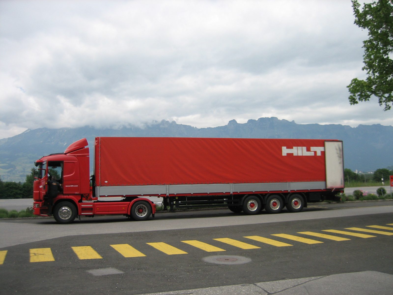 A Hilti truck parked in front of the mountains near the plant and headquarters in Liechtenstein.