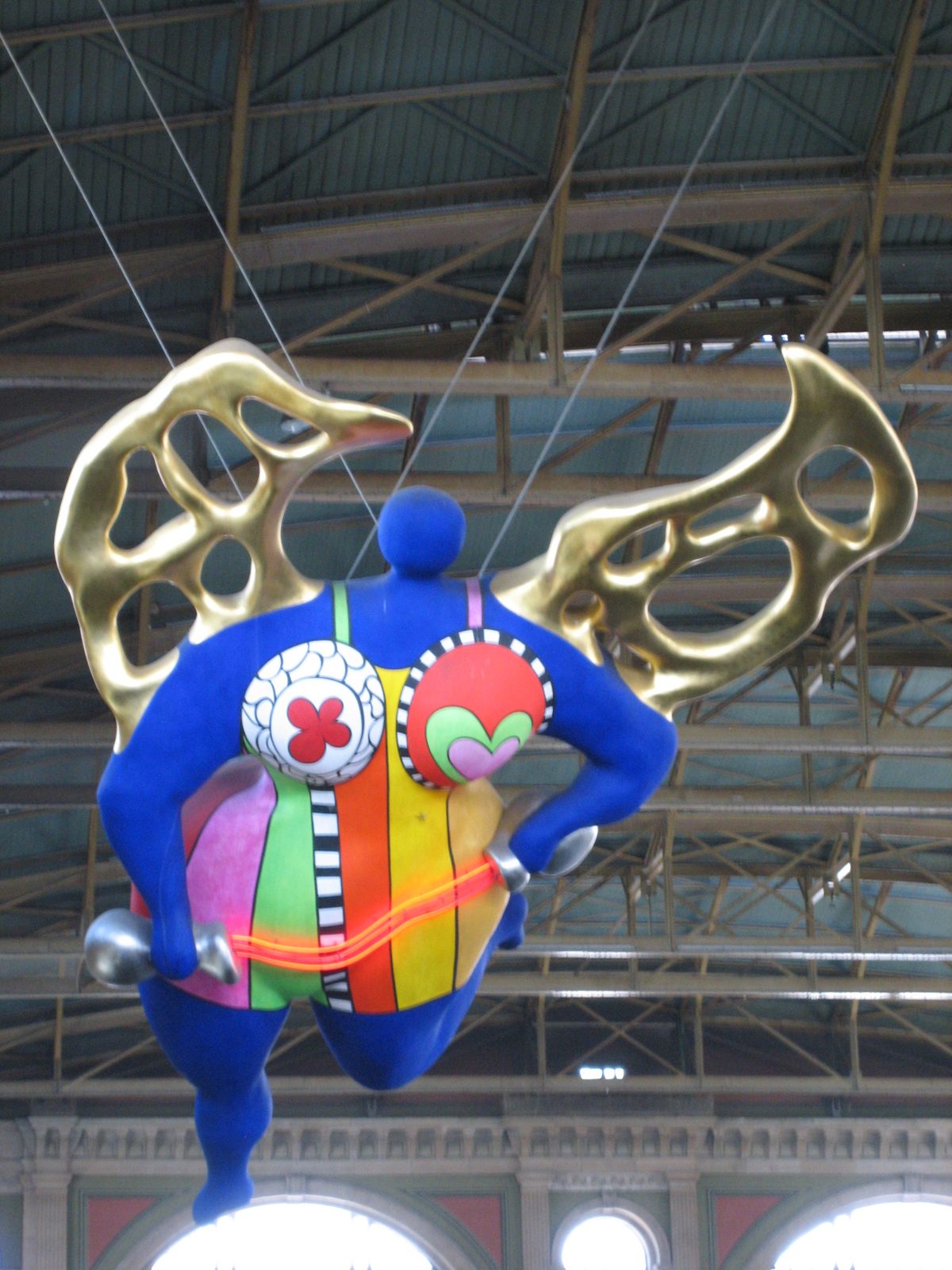 The crazy flying lady-angel in the Zurich train station.
