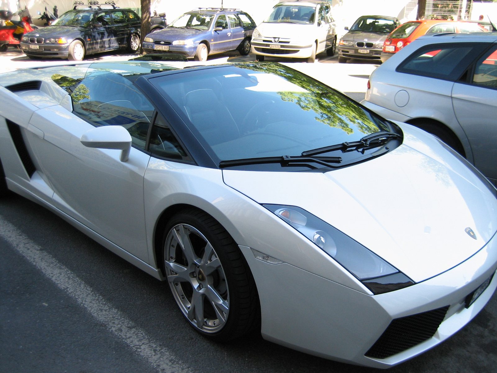Lamborghini, anyone?  As Maggie was admiring it (a bit closely), the owner walked up, not...