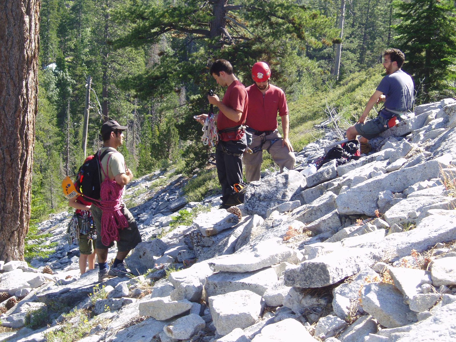 The crew prepares for the climb.  From left to right: Caroline (obscured), Adam, Colin, Mike and Eliah.
