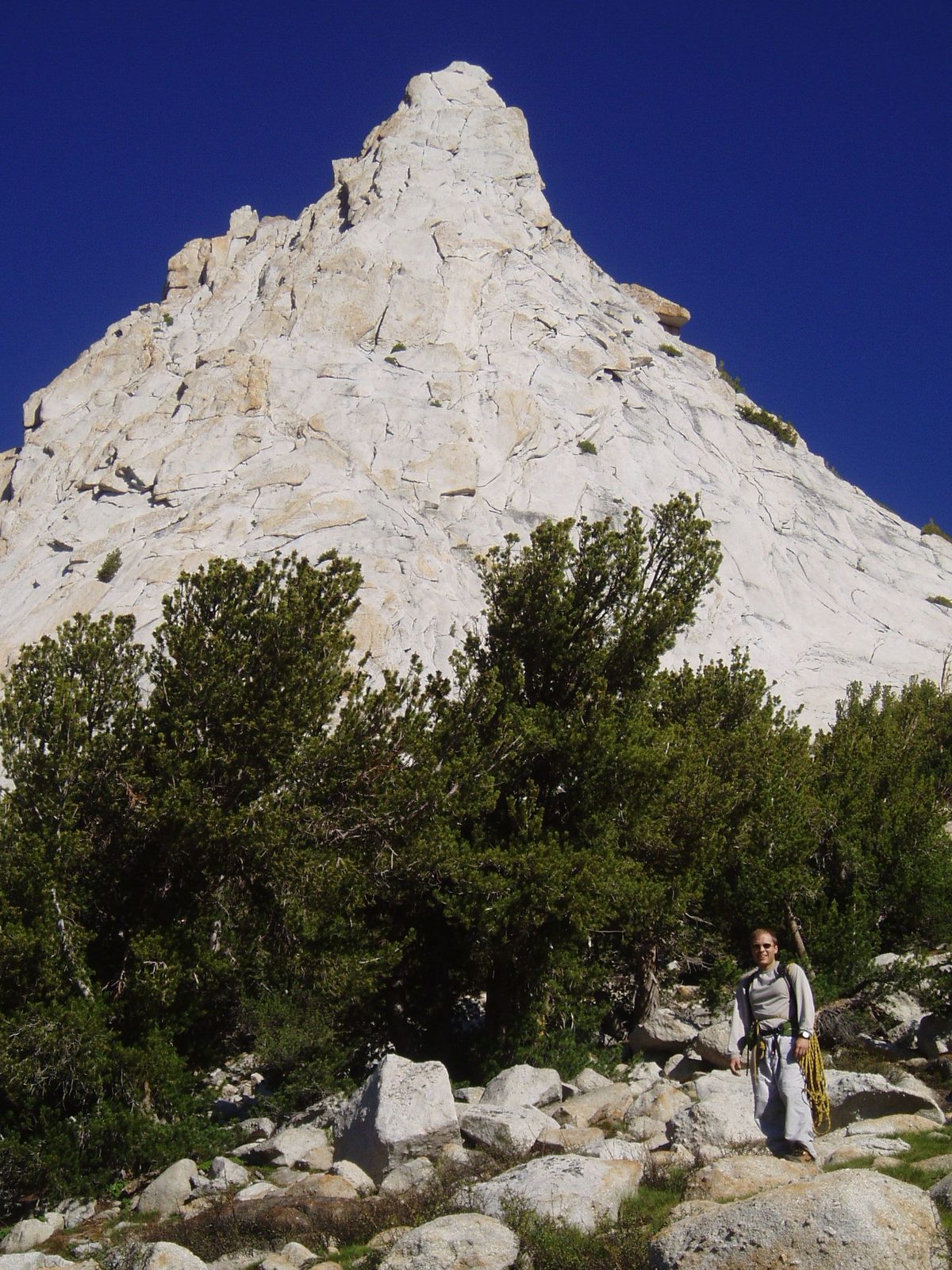 John at the base of the southwest buttress of Cathedral Peak.  The climbing route roughly goes...
