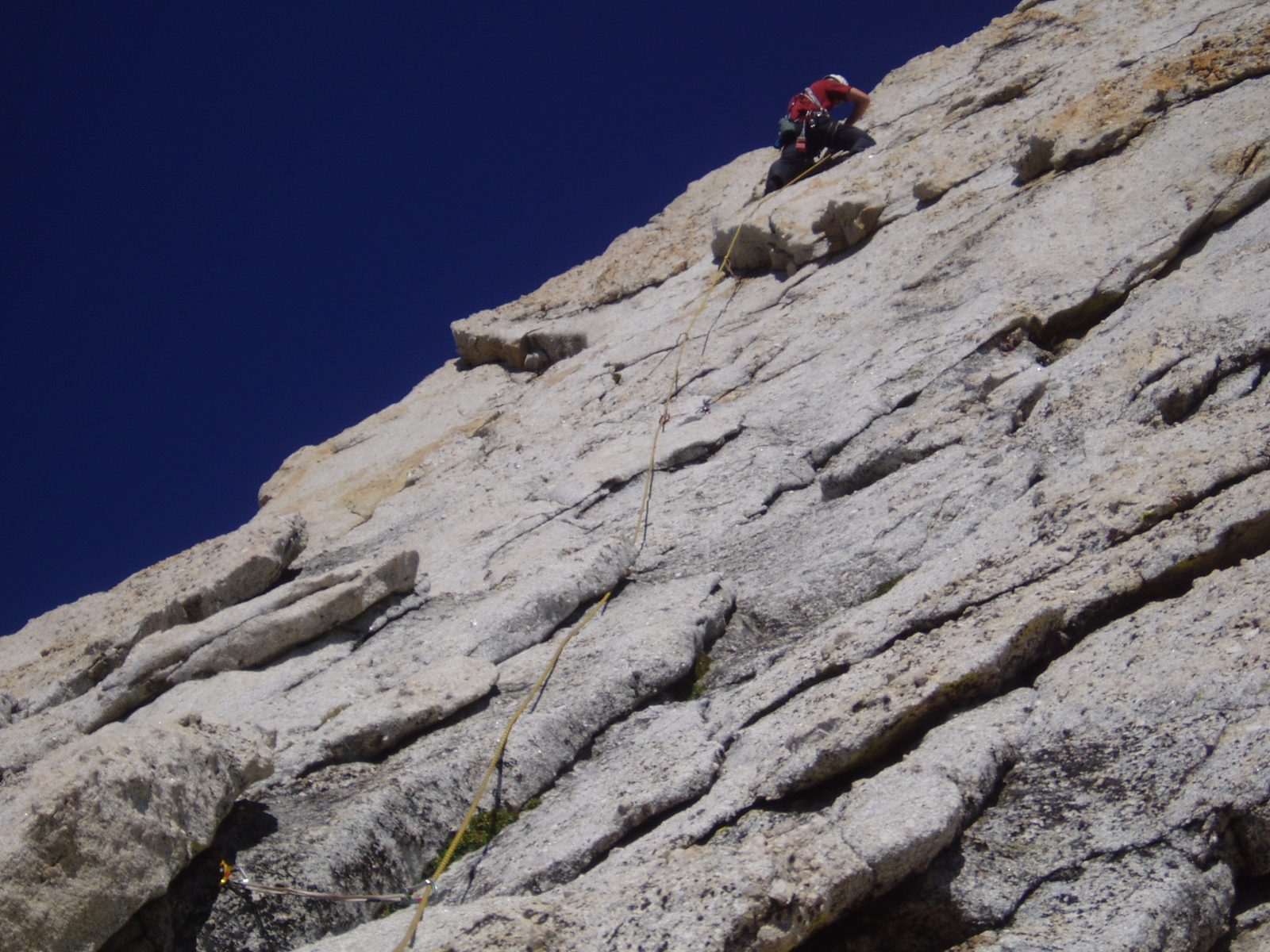 Colin placing a piece on the first pitch of Cathedral Peak.