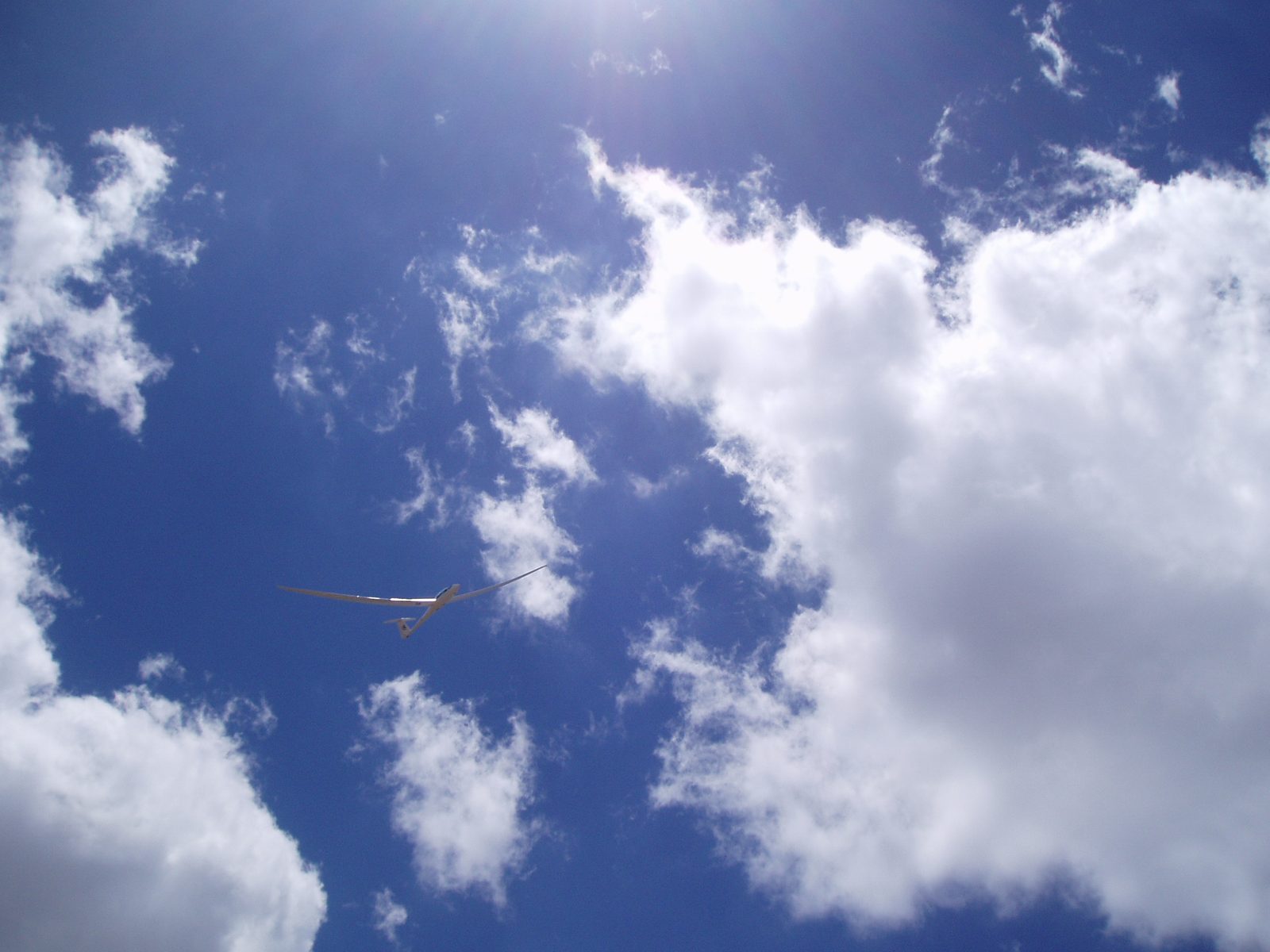 We get buzzed by a glider at 14,252 feet.