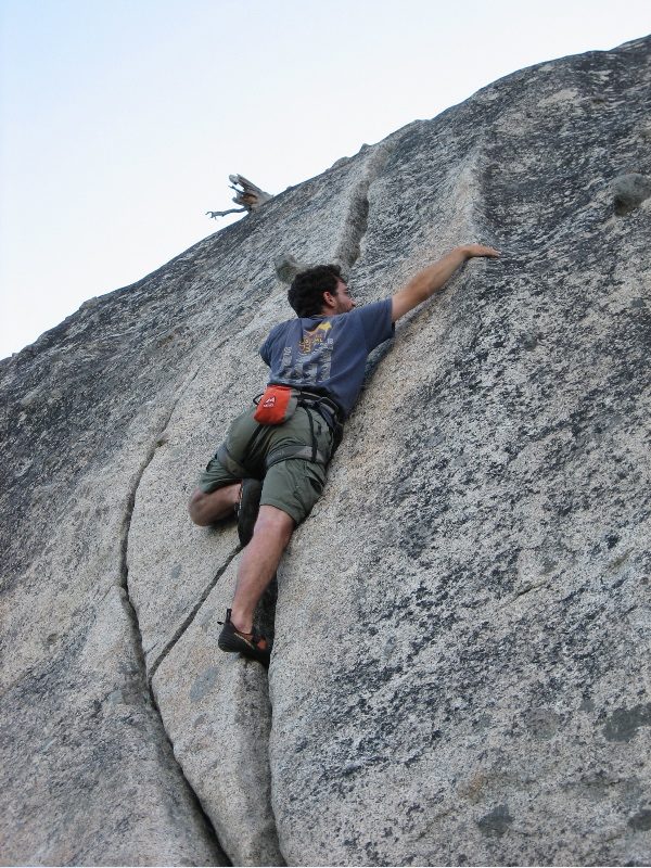 Eliah crack climbing.