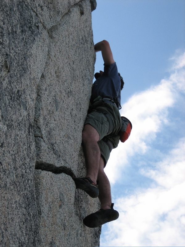 Eliah crack climbing.
