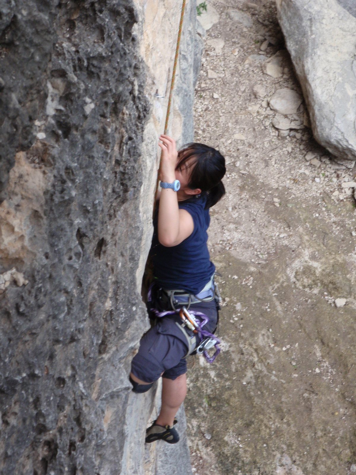Monica making the first crux move.