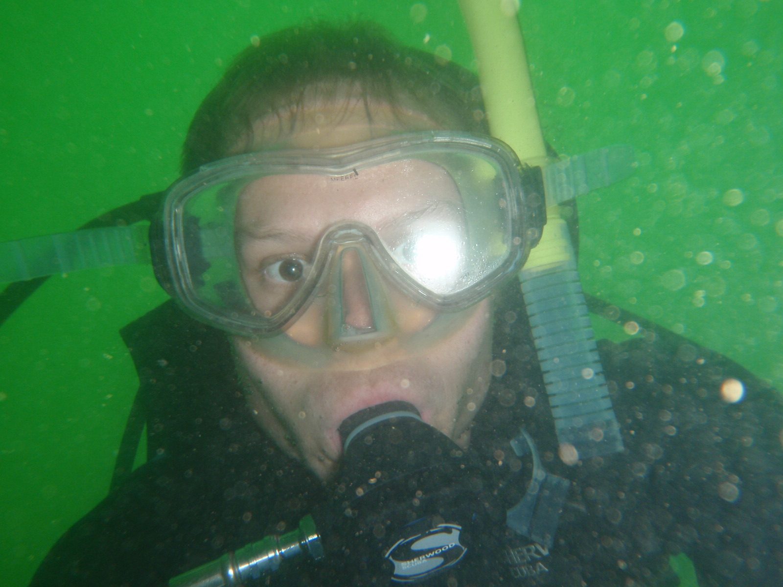 Taking another portrait with a flash. Behind me is actually theoretically the surface of the...