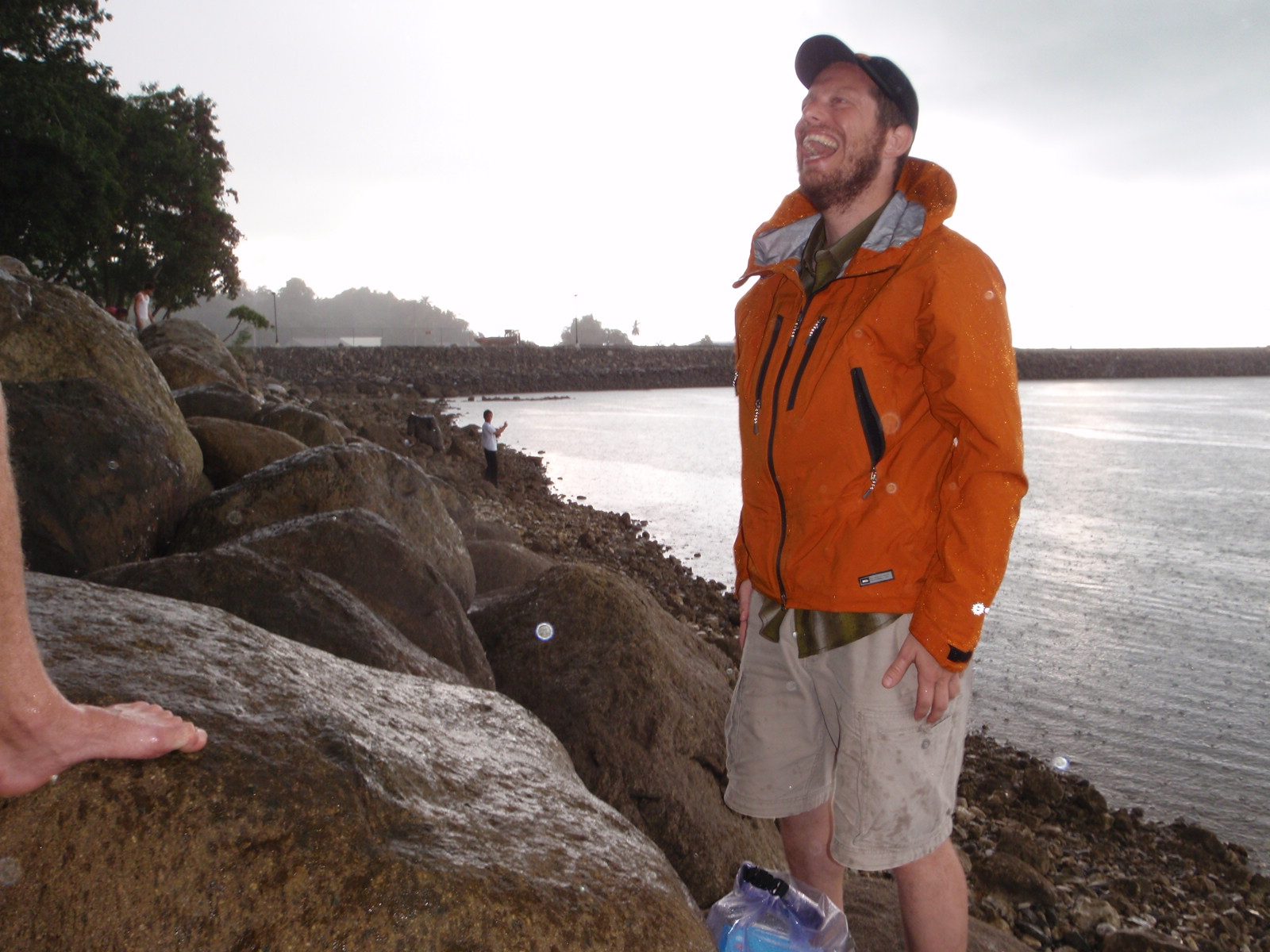 Joel laughing in the rain in Quepos.