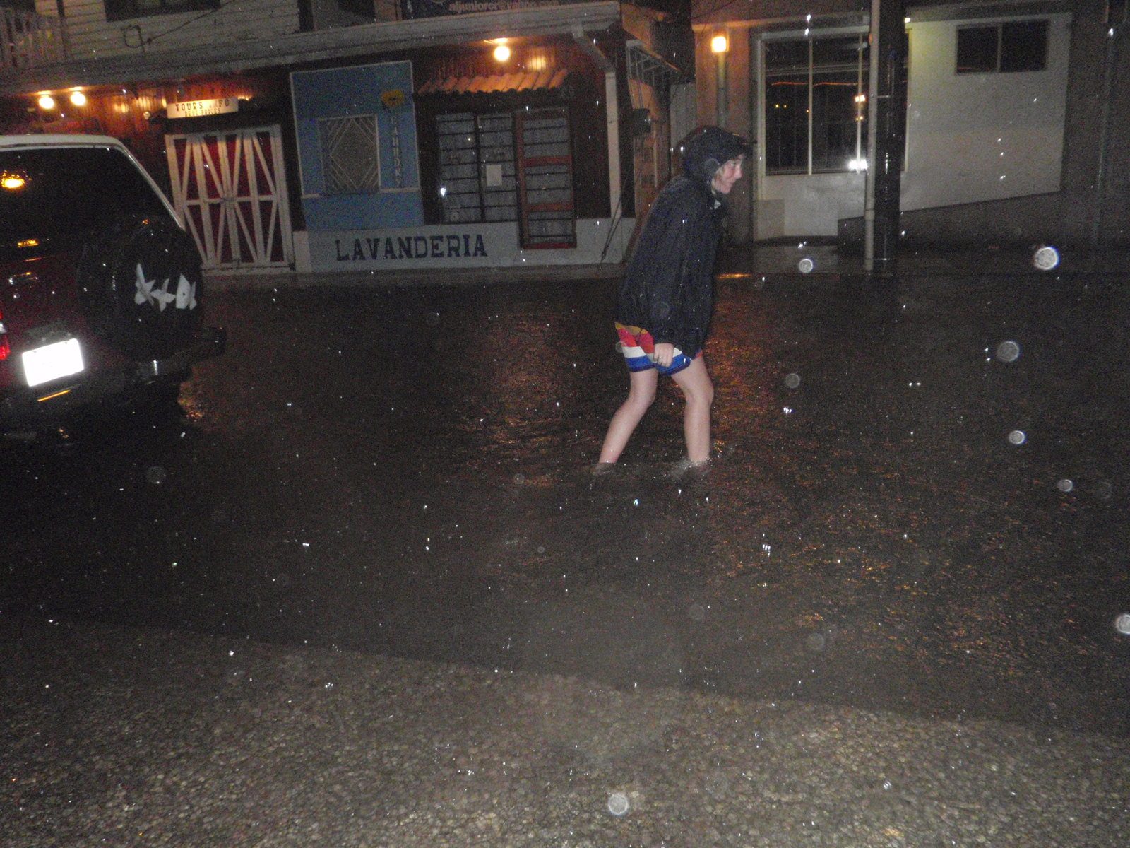 Morgan is tempted to wade in the street as well. Joel and I did not participate.