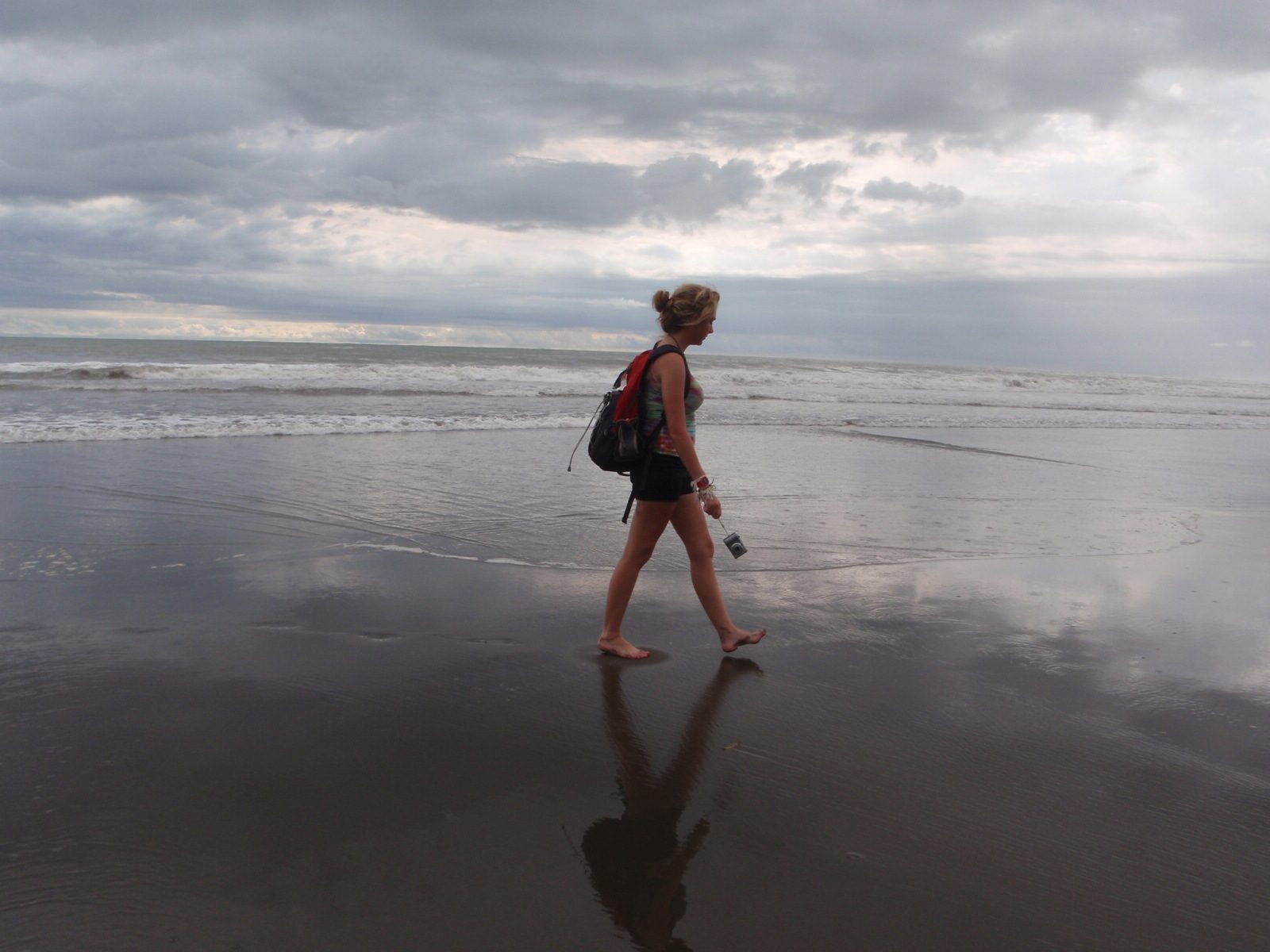 Morgan walking on the beach.
