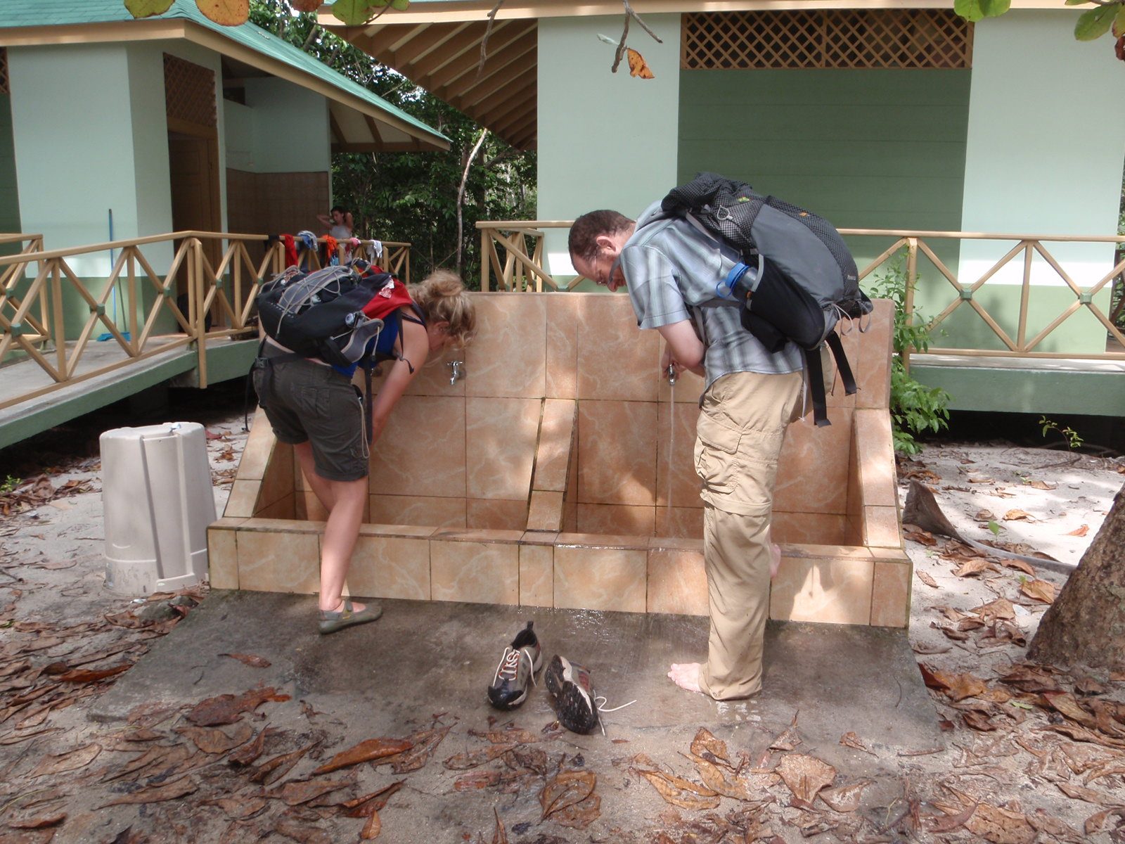 Joel and Morgan wash their feet in a conveniently placed foot bath.