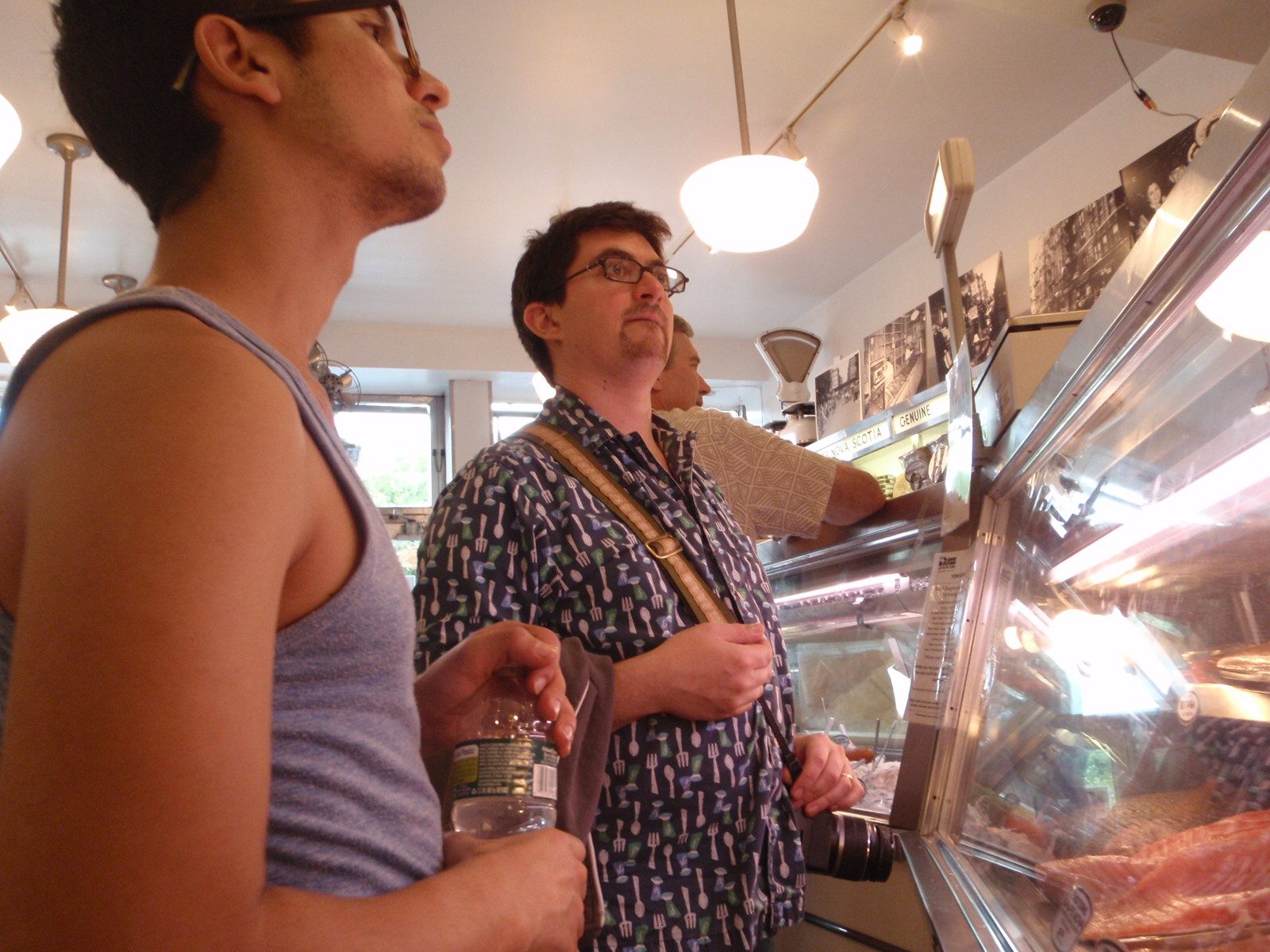 Jesse waits to put in his order for assorted types of pickled herring.