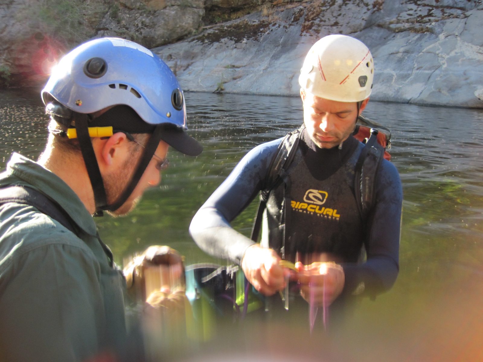 Joel and Colin pack the rope. Sadly, we noticed a core shot near the end of this rope, so my 60...