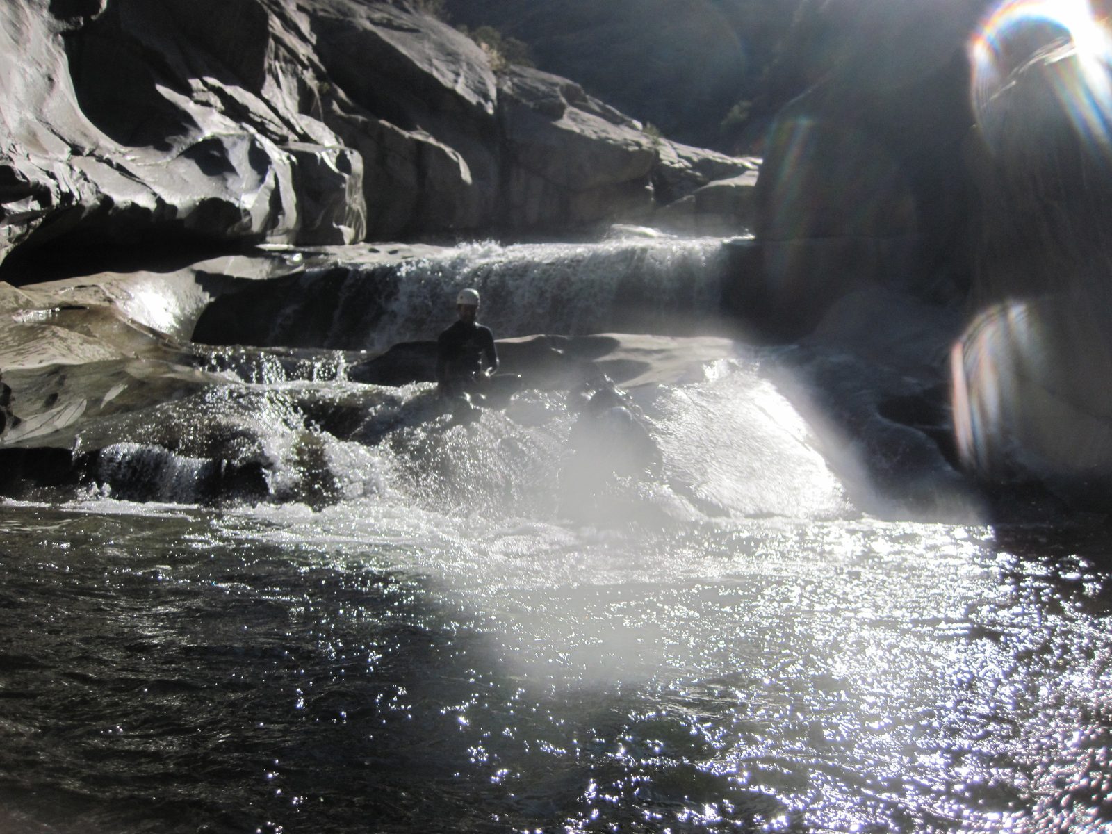 Colin, playing on a water slide.