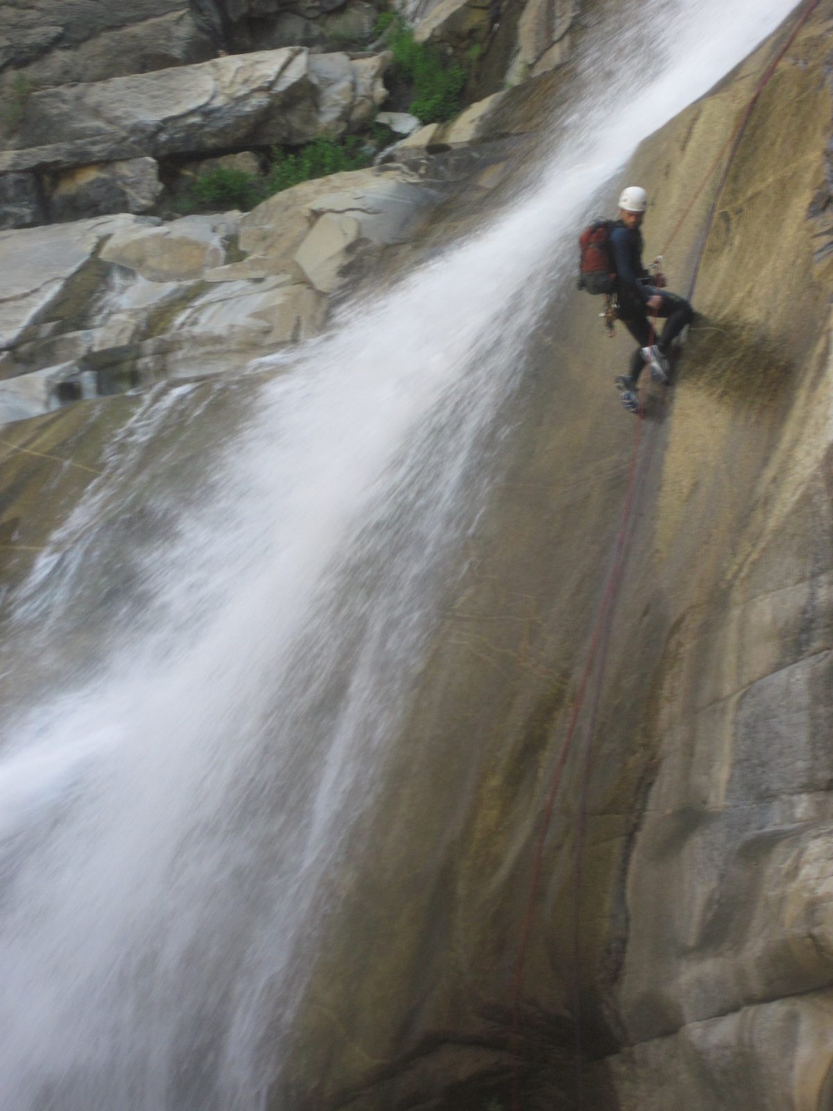 Colin, rappelling down the 150 foot waterfall. It was incredibly slippery, even with approach...