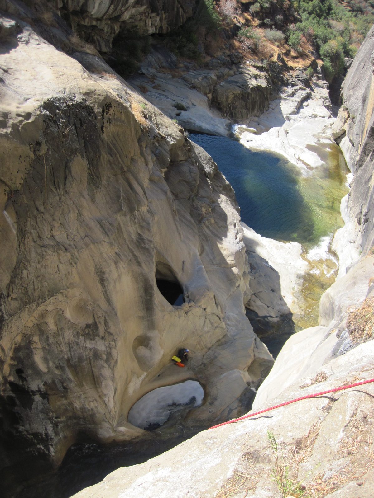 Joel waits below while we use a rope to get down the Big Kahuna drop.