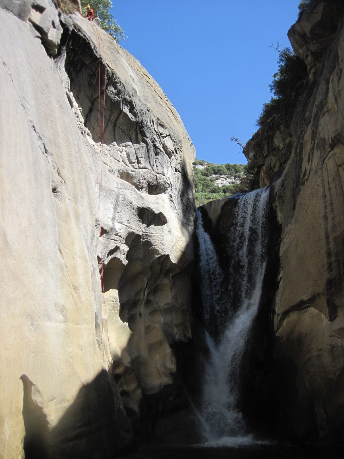 John sets up rigging to rappel the Big Kahuna.