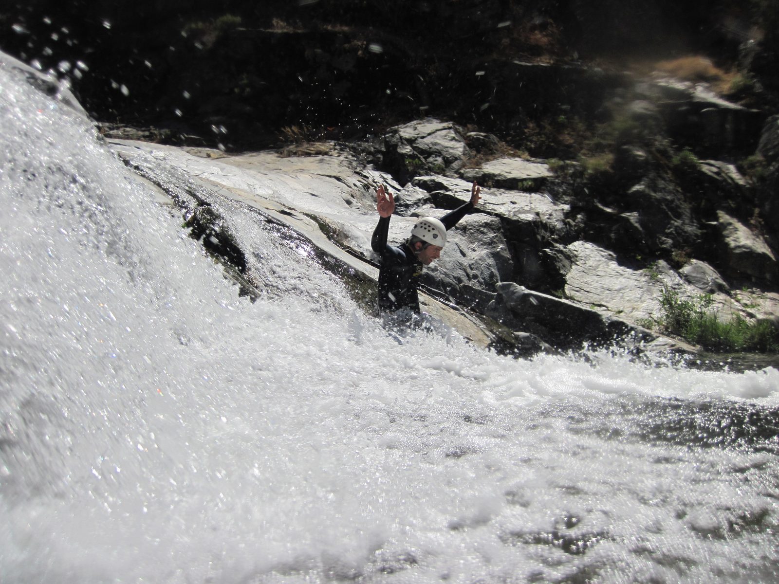 Colin, having fun on a small waterfall.