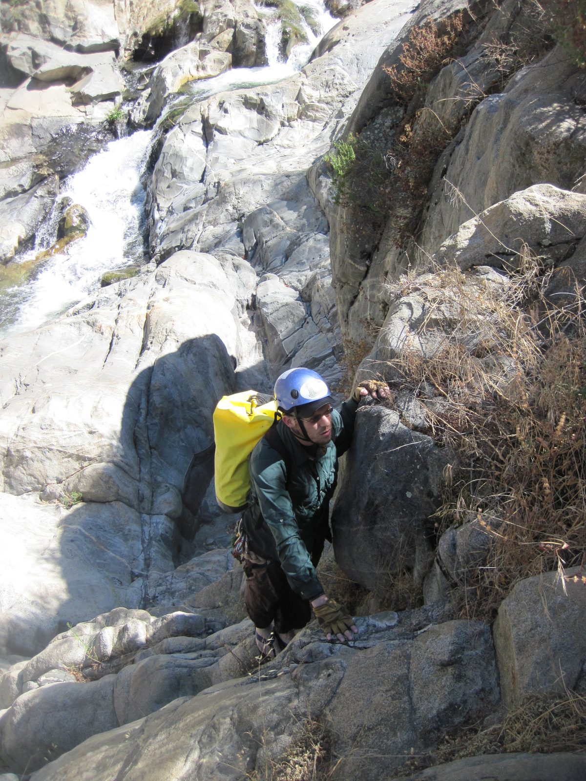 Joel finds that 4th class climbing is hard in flip flops.