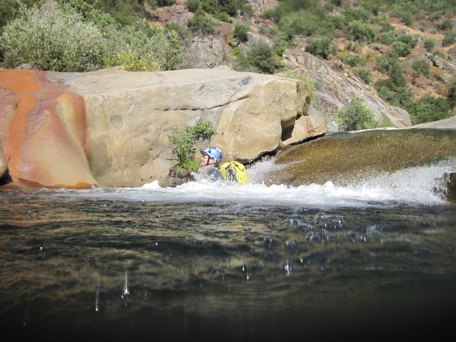 Joel on a water slide.