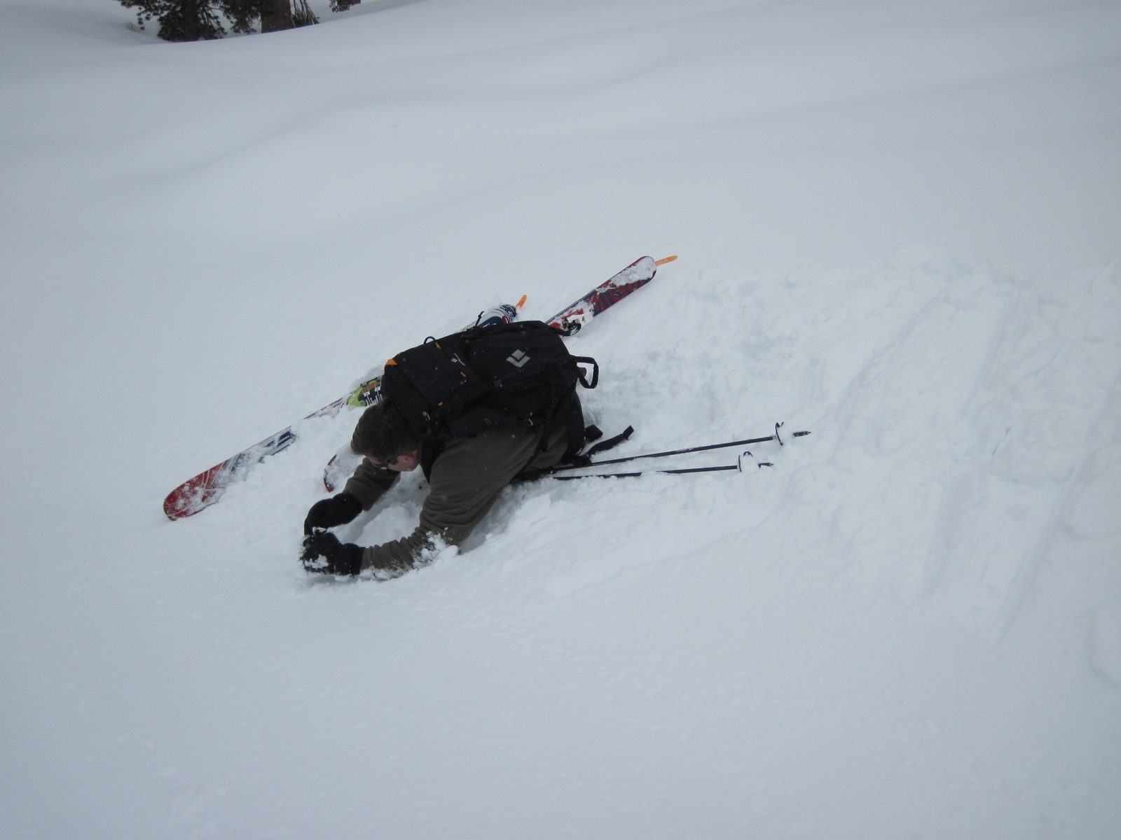 Tom, one of my classmates, takes a measurement of slope angle. The likelihood of avalanches...
