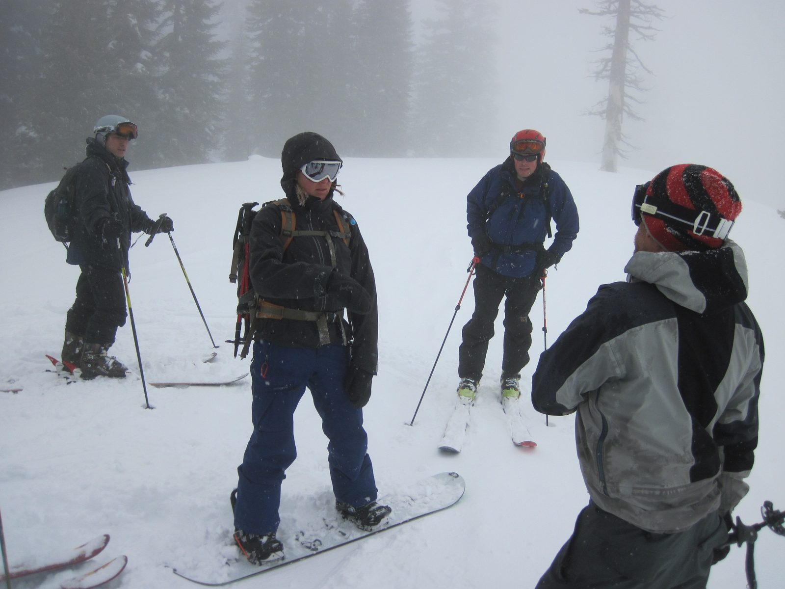 After skiing to the bottom, we skinned back to the top of the hill for a second lap. Here we...