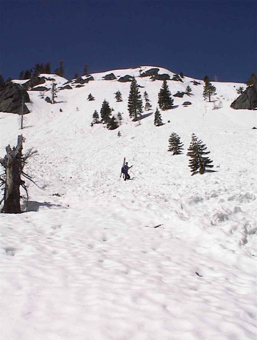 John crossing an avalanche zone near Alpine Meadows Resort (apparently on private property...