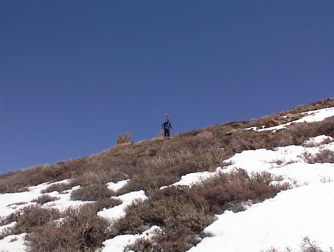 John on an exposed ridgeline on the ridge leading north from the summit of Alpine meadows.