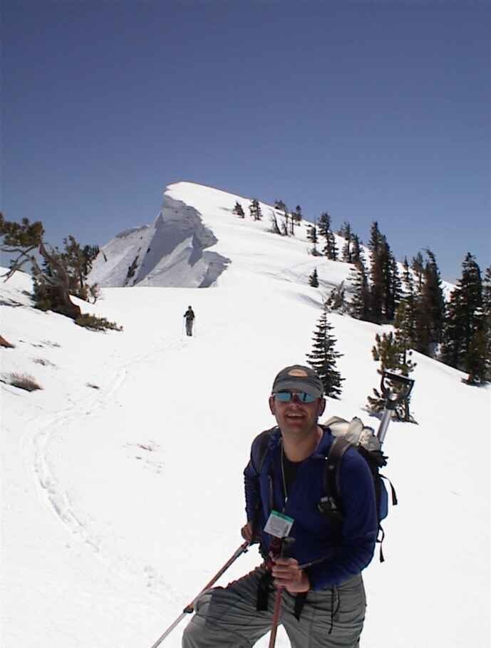 Niels, with Rachel and a cornice in the background.