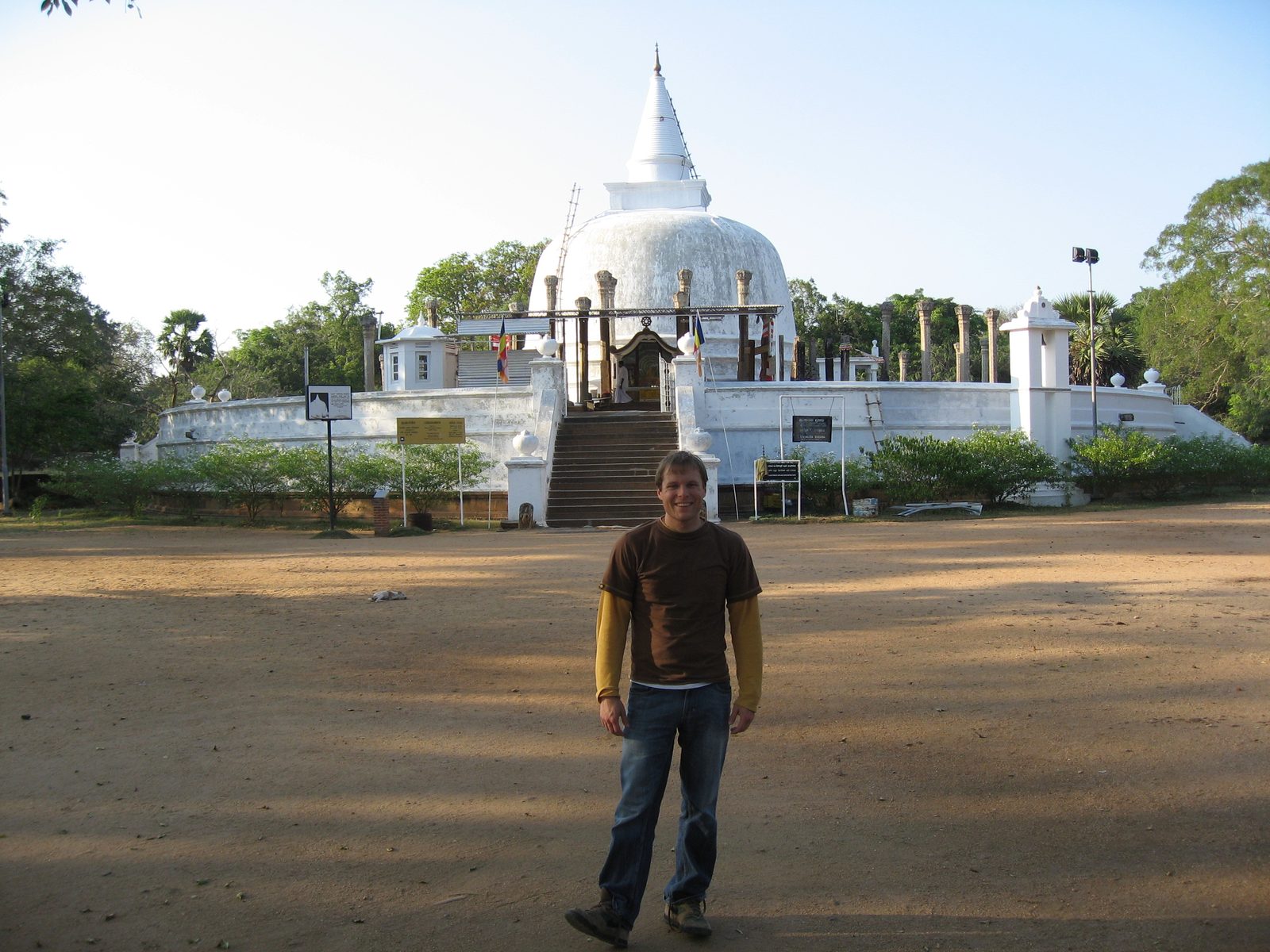 John in front of a stupa at Anuradhapura that was being restored.