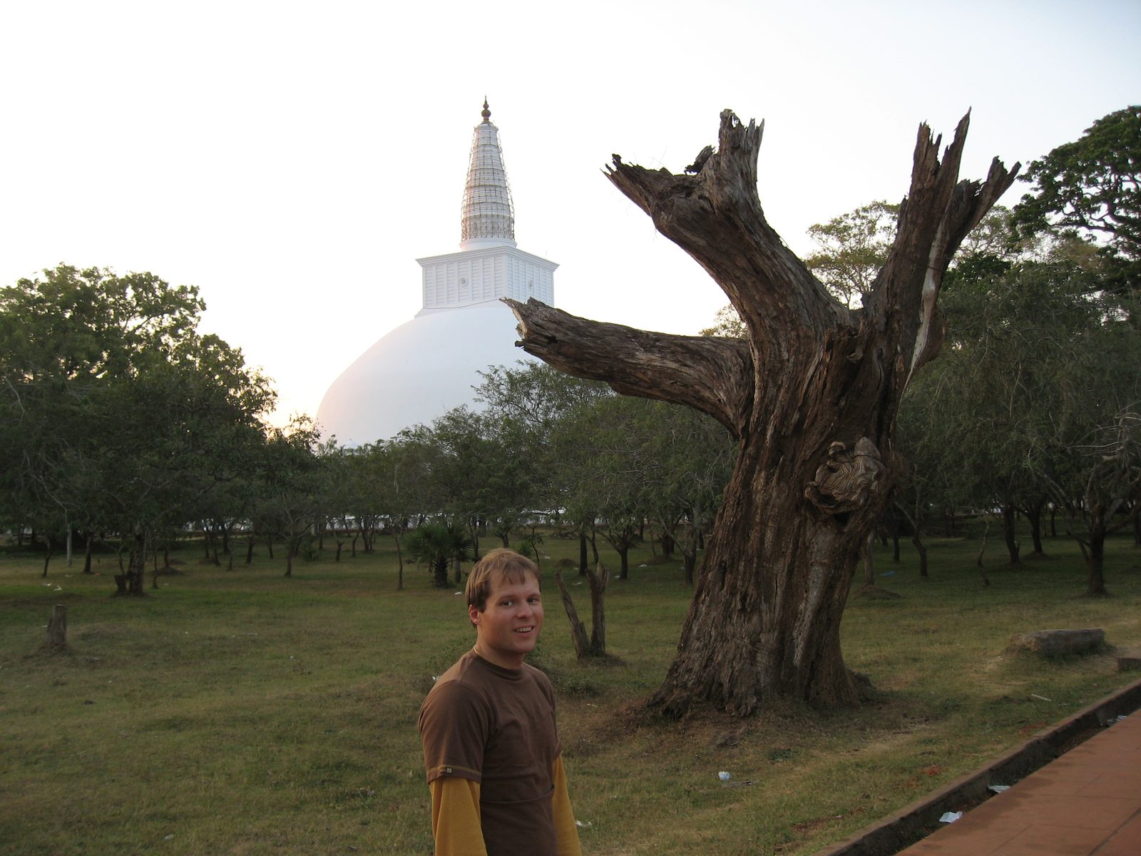 John at Anaranapura with one of the massive dagobas in the background.