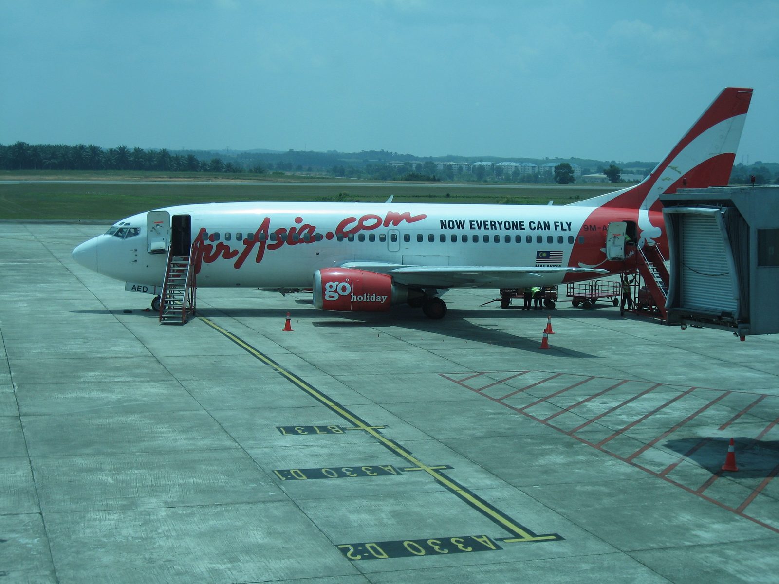 Our modern 737 waiting to take us from Johor Bahru (just across the water from Singapore on the...