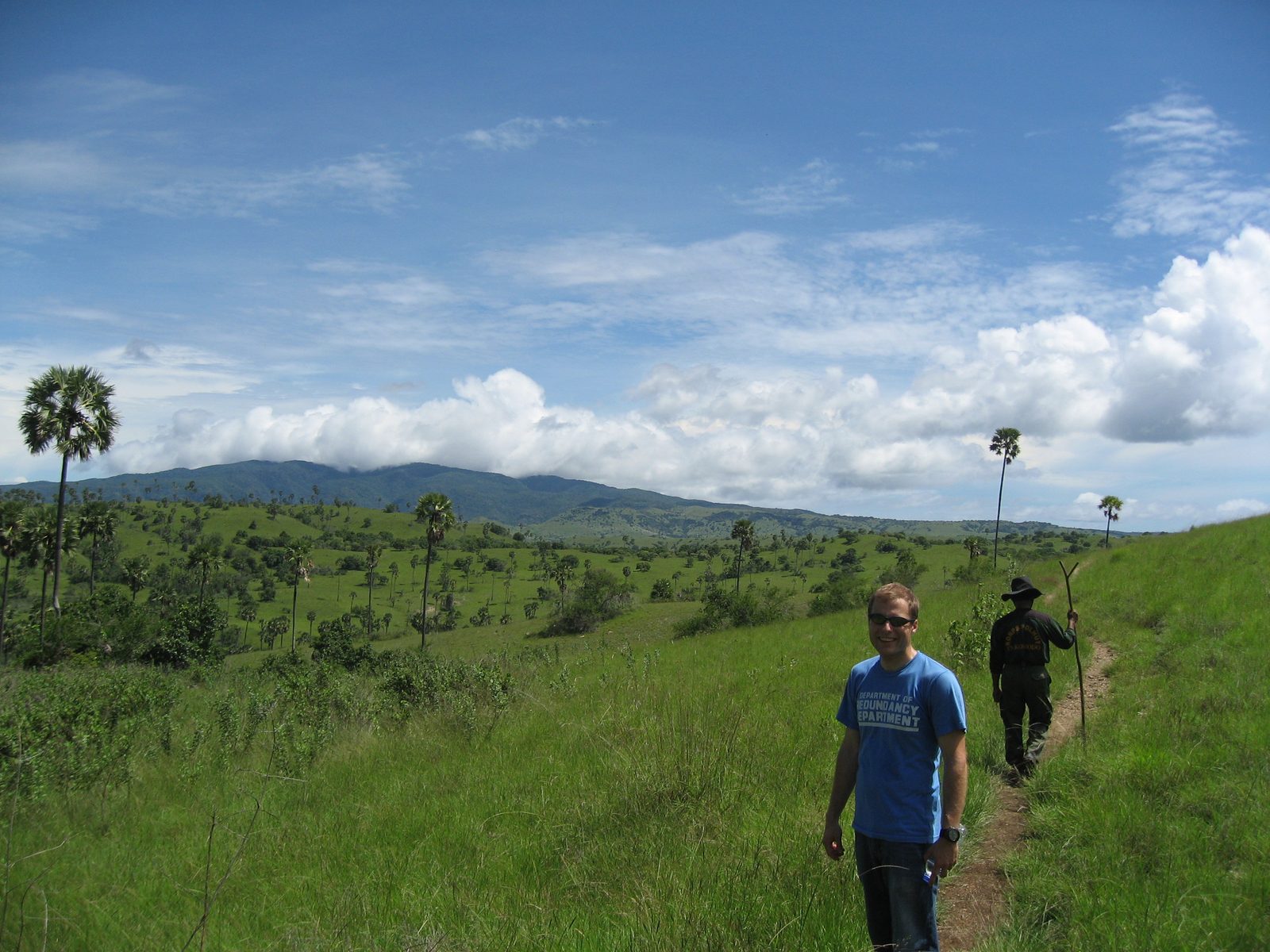 John hikes in Komodo National Park (Rinca Island).  Our guide is in the background.