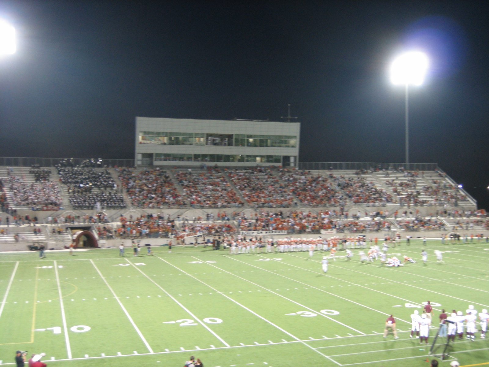 Press box and the home team side (do you see the size of the band on the left side of the stands?).