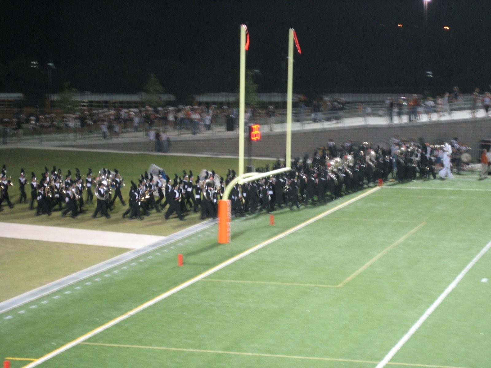 The band coming down to get ready for halftime.