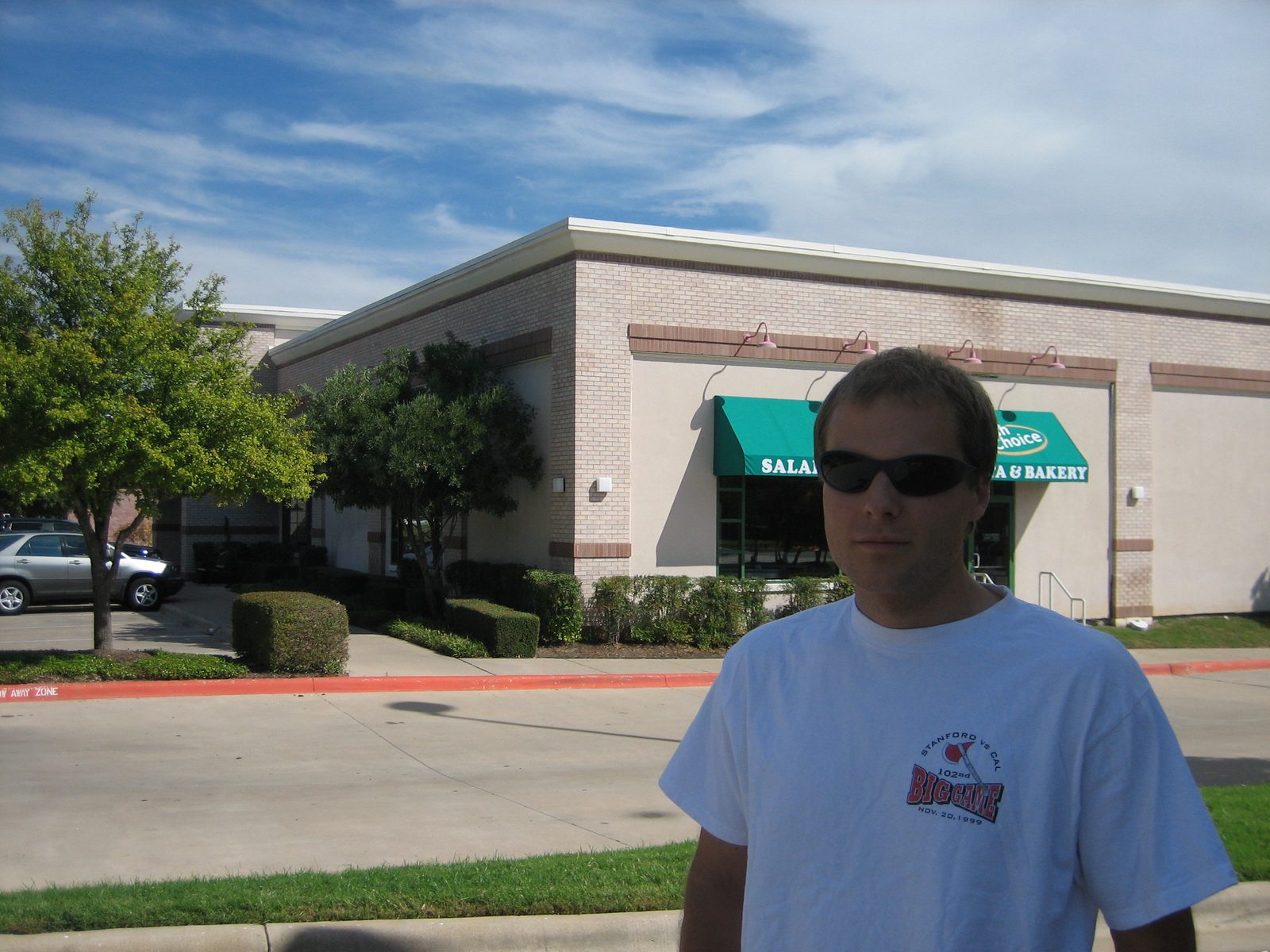 John in front of what might have been next door to Chatchkie's, in Office Space.