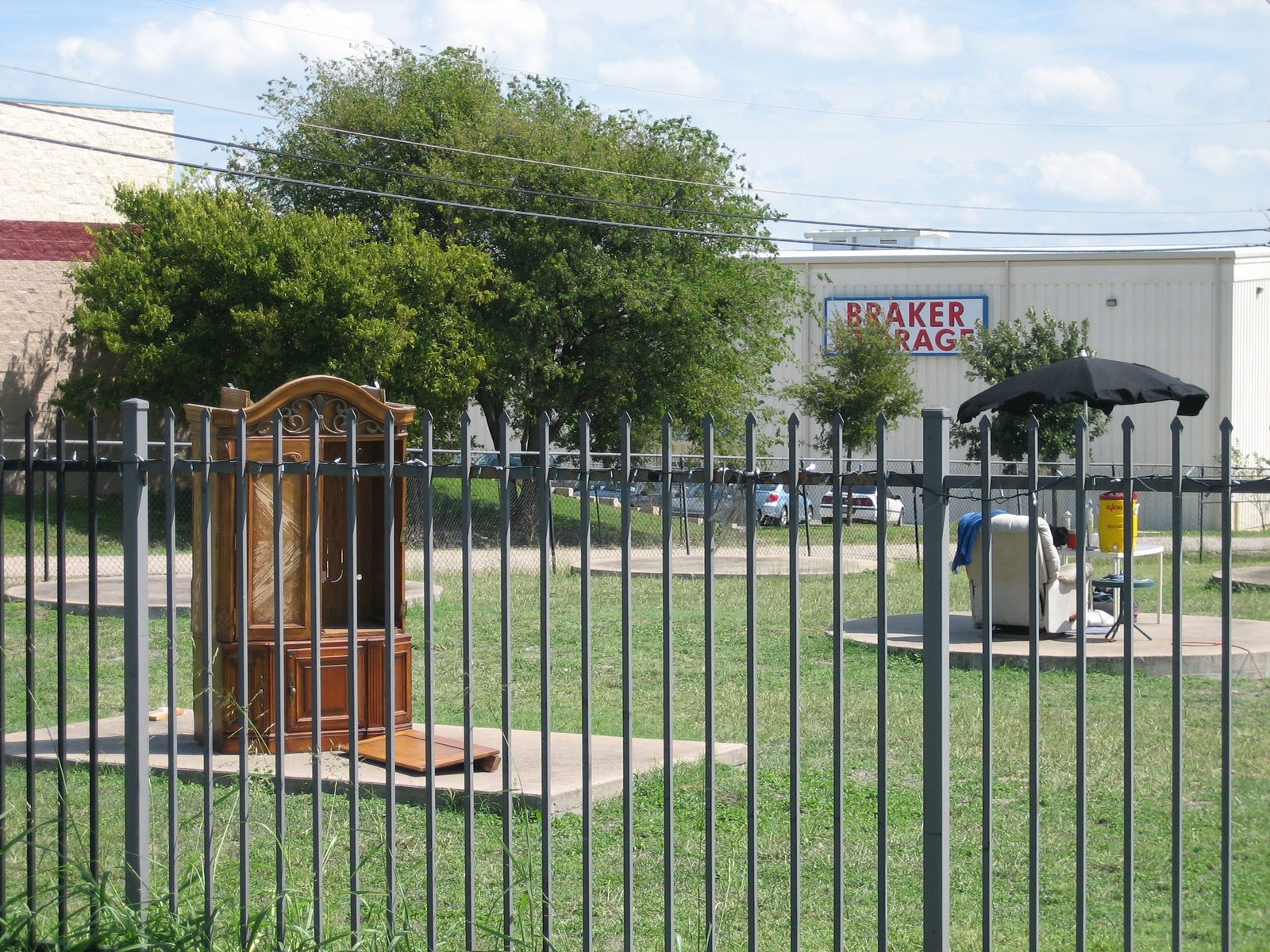Complete with lawn for displaying furniture like this fine armoir.  Discount for the fact that...